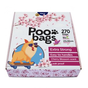 Caja blanca con un perro en la portada y un arbol de cerezo con el logo "poo bags" en el centro de la misma.