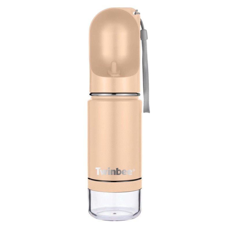 Bebedero portátil para perro de color rosa.