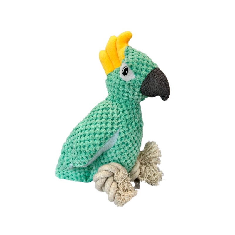 Imagen de un peluche verde para perros, con forma de guacamayo