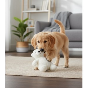 Perro jugando con peluche con forma de oso polar.