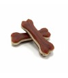 Snack de pato para perro con forma de hueso.