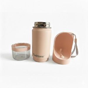 Partes de un bebedero  portátil para perros de color rosa.