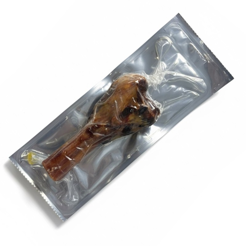 Medio hueso de jamón para perro.