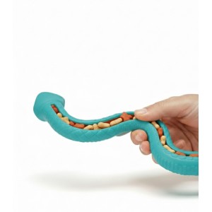Juguete rellenable TPR con snacks para perro.